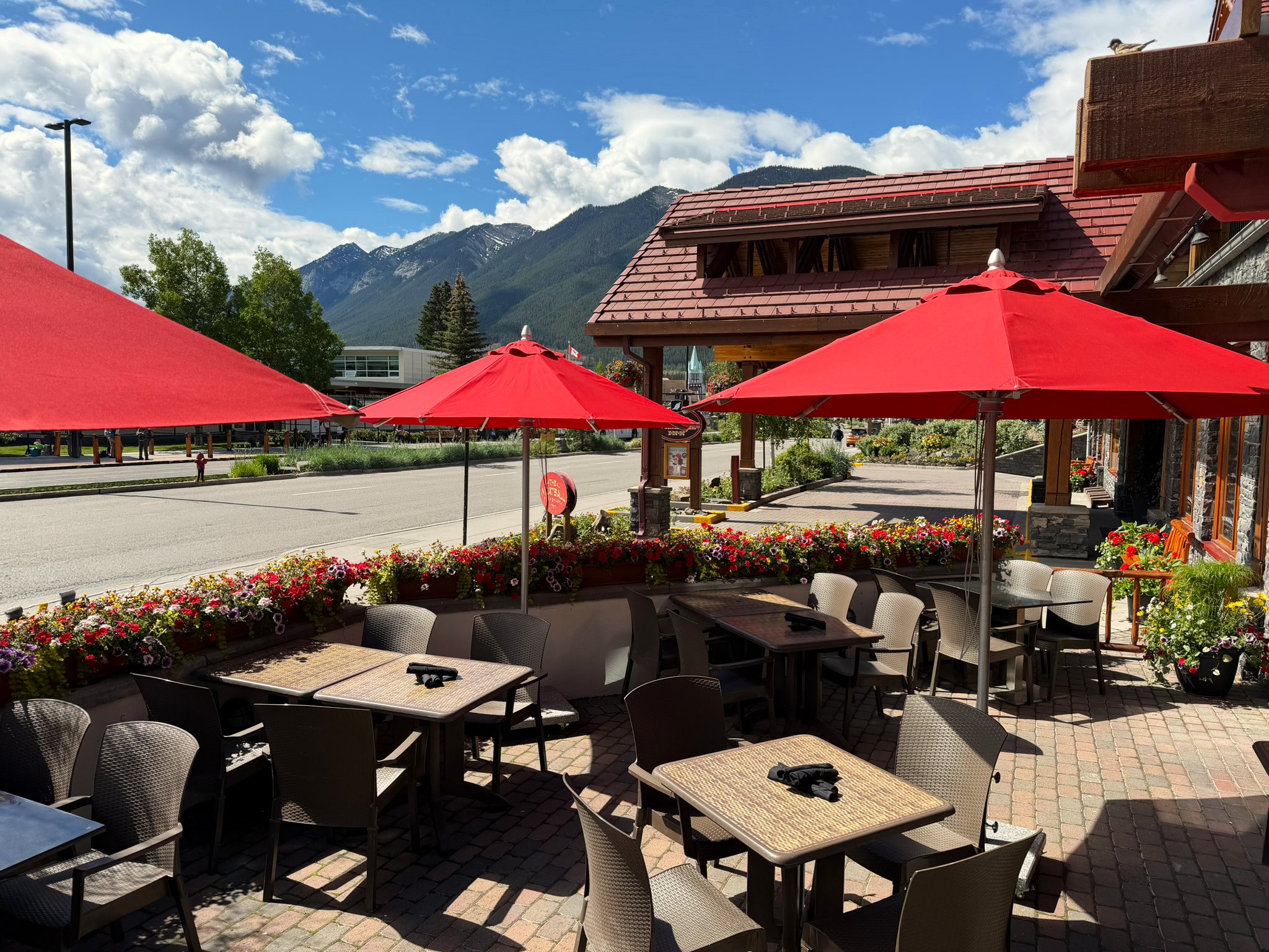 Meatball Patio The Meatball Patio with blue skies, mountain views and red umbrellas