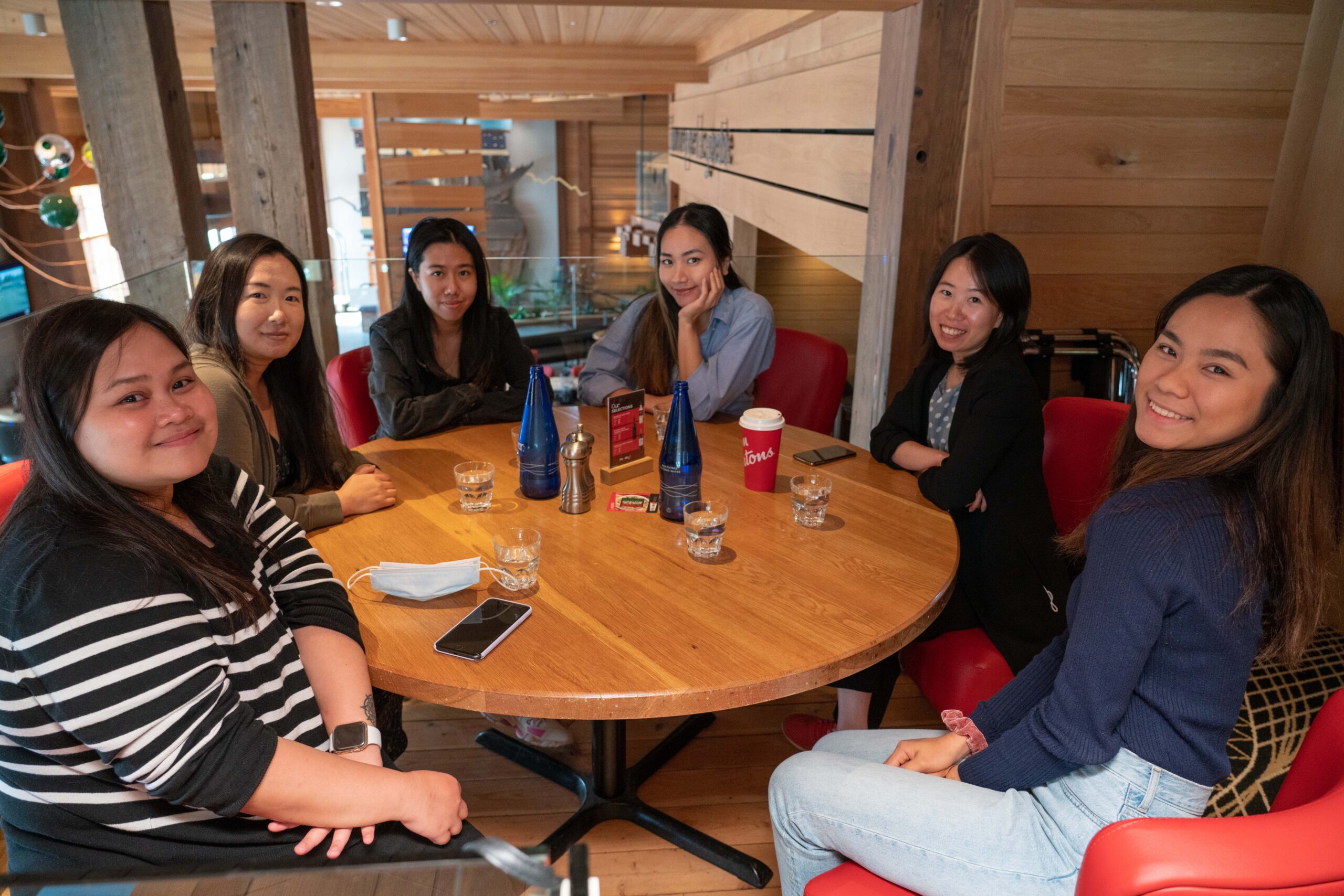 Hospitality students sitting at a table Group of hospitality students