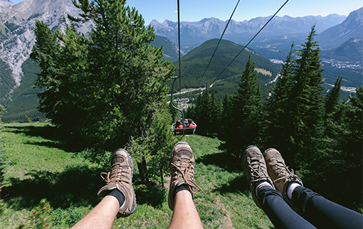Summer adventures at Mount Norquay near Banff, featuring Via Ferrata, hiking, e-bikes, and alpine dining.