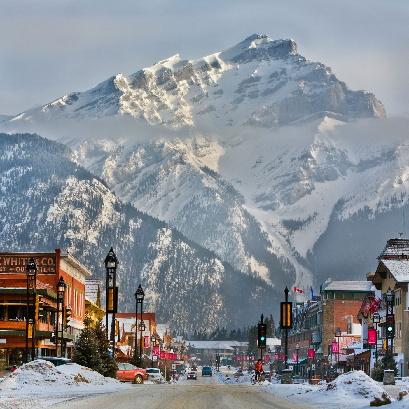 banff avenue in the winter looking towards cascade mountain in the distance