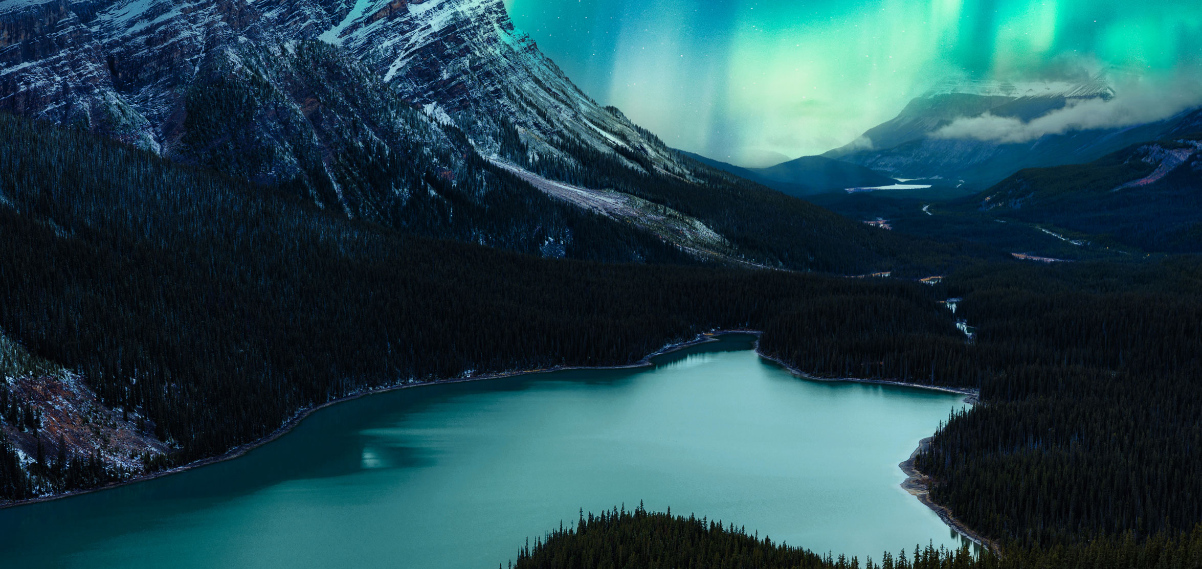 scenery of aurora glowing over peyto lake banff national park